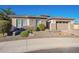 Charming home exterior with stone accents and a two-car garage at 2200 E Aquarius Pl, Chandler, AZ 85249