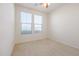 Simple bedroom with carpeted floors and window at 16914 S 180Th Ave, Goodyear, AZ 85338