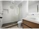 Modern bathroom with walk-in shower, floating vanity, and subway tile at 5525 E Lincoln Dr # 124, Paradise Valley, AZ 85253