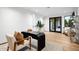 Light-filled home office with hardwood floors and access to backyard at 5525 E Lincoln Dr # 124, Paradise Valley, AZ 85253
