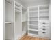 Large walk-in closet with ample shelving and hanging space at 5525 E Lincoln Dr # 124, Paradise Valley, AZ 85253