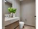 Modern bathroom with a floating vanity and a large walk-in shower at 5525 E Lincoln Dr # 124, Paradise Valley, AZ 85253