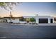 Modern home with white stucco exterior, black accents, and two-car garage at 5525 E Lincoln Dr # 124, Paradise Valley, AZ 85253