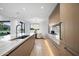 Modern kitchen with wood cabinetry, marble countertops, and a spacious layout at 5525 E Lincoln Dr # 124, Paradise Valley, AZ 85253
