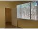 Bedroom with window, closet, and carpet flooring at 16013 S Desert Foothills Pkwy # 1101, Phoenix, AZ 85048