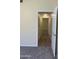 Bright hallway with light flooring and access to bedrooms at 16013 S Desert Foothills Pkwy # 1101, Phoenix, AZ 85048