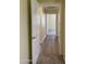 Hallway with carpet and wood-look flooring at 16013 S Desert Foothills Pkwy # 1101, Phoenix, AZ 85048