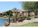 Community lakefront view with walking paths and desert landscaping at 16013 S Desert Foothills Pkwy # 1101, Phoenix, AZ 85048