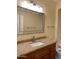 Bathroom with granite vanity, mirror, and bathtub at 16013 S Desert Foothills Pkwy # 1101, Phoenix, AZ 85048