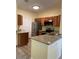 Modern kitchen with granite countertops and stainless steel appliances at 16013 S Desert Foothills Pkwy # 1101, Phoenix, AZ 85048