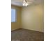 Bright bedroom featuring a large window and closet at 16013 S Desert Foothills Pkwy # 1101, Phoenix, AZ 85048