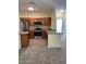 Modern kitchen with granite countertops and stainless steel appliances at 16013 S Desert Foothills Pkwy # 1101, Phoenix, AZ 85048