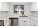 Modern kitchen with white shaker cabinets and quartz countertops at 839 S Westwood -- # 182, Mesa, AZ 85210