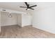 Spacious living room with light walls, ceiling fan, and wood-look floors at 839 S Westwood -- # 182, Mesa, AZ 85210