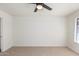 Bright bedroom with ceiling fan and neutral carpeting at 839 S Westwood -- # 182, Mesa, AZ 85210