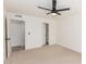 Well-lit bedroom with ceiling fan, carpet, and ample closet space at 839 S Westwood -- # 182, Mesa, AZ 85210