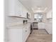 Modern kitchen featuring white cabinets and stainless steel appliances at 839 S Westwood -- # 182, Mesa, AZ 85210