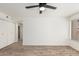 Bright bedroom with wood-look floors and ceiling fan at 839 S Westwood -- # 182, Mesa, AZ 85210
