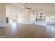 Open living room with vaulted ceilings and light wood floors at 19832 N 95Th Ave, Peoria, AZ 85382