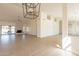 Open living area with vaulted ceiling and wood floors at 19832 N 95Th Ave, Peoria, AZ 85382