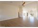Spacious living room with high ceilings and wood-look floors at 19832 N 95Th Ave, Peoria, AZ 85382