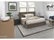 Spacious bedroom with plush bed and modern decor at 16092 W Questa Dr, Surprise, AZ 85387