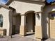 Elegant entryway with arched details and modern lighting at 16092 W Questa Dr, Surprise, AZ 85387