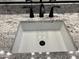 Modern bathroom sink with granite countertop and black matte faucet at 16092 W Questa Dr, Surprise, AZ 85387