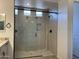 Bathroom with large walk-in shower and modern fixtures at 16092 W Questa Dr, Surprise, AZ 85387