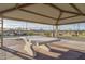 Covered outdoor ping pong table at 16092 W Questa Dr, Surprise, AZ 85387