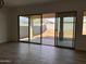 View of backyard through sliding glass door at 16092 W Questa Dr, Surprise, AZ 85387