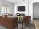 Living room with fireplace, built-in shelving and sliding glass doors at 16092 W Questa Dr, Surprise, AZ 85387