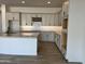 Modern kitchen with granite countertops and ample cabinetry at 16092 W Questa Dr, Surprise, AZ 85387