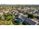 Aerial view showcasing a home with a pool and beautifully landscaped backyard at 1322 W Indigo Dr, Chandler, AZ 85248