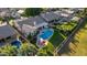 Aerial view of a home with a kidney-shaped pool and spacious backyard at 1322 W Indigo Dr, Chandler, AZ 85248