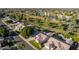 Community overview featuring homes, golf course and lake at 1322 W Indigo Dr, Chandler, AZ 85248