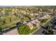 Aerial view showcasing home's location in a community near a golf course and lake at 1322 W Indigo Dr, Chandler, AZ 85248