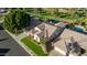 Aerial view of a single-Gathering home with a tile roof and a green lawn at 1322 W Indigo Dr, Chandler, AZ 85248