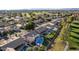 Wide aerial view of community showing homes and green spaces at 1322 W Indigo Dr, Chandler, AZ 85248