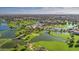 Aerial view of a luxury community with golf course, lakes, and resort-style amenities at 1322 W Indigo Dr, Chandler, AZ 85248