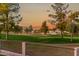 Luxury homes and golf course views at sunset at 1322 W Indigo Dr, Chandler, AZ 85248