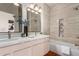 Spa-like bathroom with double vanity and a large soaking tub at 1322 W Indigo Dr, Chandler, AZ 85248