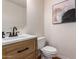 Modern bathroom with light wood vanity and updated fixtures at 1322 W Indigo Dr, Chandler, AZ 85248
