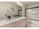 Modern bathroom with double vanity and walk-in shower at 1322 W Indigo Dr, Chandler, AZ 85248