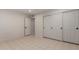 Bright bedroom with tile floors and large closet at 1322 W Indigo Dr, Chandler, AZ 85248
