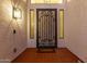 Elegant entryway with an ornate door and tiled floor at 1322 W Indigo Dr, Chandler, AZ 85248