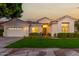 Beautiful one-story home with a well-manicured lawn at 1322 W Indigo Dr, Chandler, AZ 85248