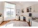 Bright home office features built-in shelving and large window at 1322 W Indigo Dr, Chandler, AZ 85248