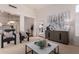 Spacious living area with modern furniture and access to backyard at 1322 W Indigo Dr, Chandler, AZ 85248