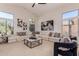 Relaxing living room with large sectional sofa and ample natural light at 1322 W Indigo Dr, Chandler, AZ 85248
